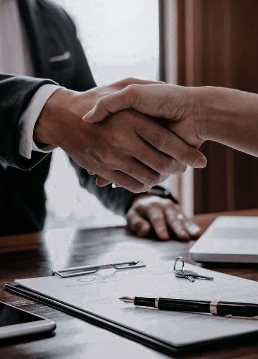 Professional handshake and business meeting